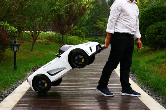 Unisex Children 12v Electric Car with Remote Control Double Drive Music and Swing Function
